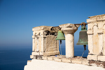 Fototapeta premium Domes, steeples, bells and white buildings of Santorini, Greece 