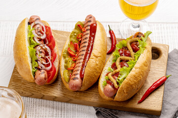 Various hot dog and beer