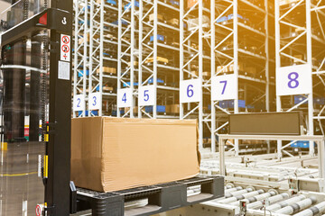 The warehouse full of goods, boxes and shelves in order. Industrial background container plant manufacturing manufacture production paperboard business deal