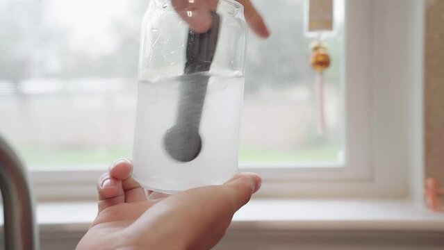 stirring creatine in water 4K