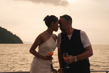Fototapeta premium A couple with a romantic vacation, honeymoon trip after the wedding ceremony.
