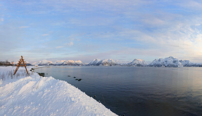 landscape at Lofoten Islands in Norway in winter and sunrise - obrazy, fototapety, plakaty