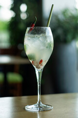 modern thai cocktail with rice wine, chilli pepper, lime and lemongrass