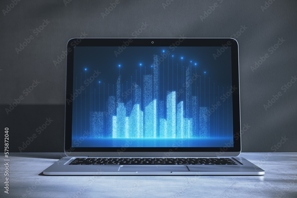 Poster close up of laptop on desktop with glowing digital city hologram on screen and gray background. city