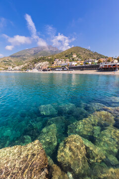 Italy, Liguria, Levanto, Seashore ofCinqueTerrewithSpiaggiaLevantobeach and hills in background