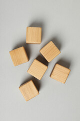 Blank wooden cubes for different concepts, top view