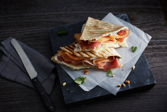 Studio shot of twoready-to-eat piadina romagnola flatbread sandwiches