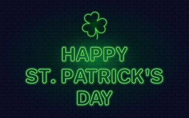 Fototapeta na wymiar Neon green lettering Happy St. Patrick's Day and clover logo on dark brick wall