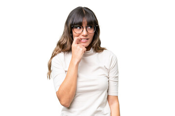 Young caucasian woman over isolated background nervous and scared