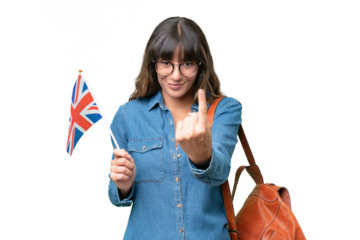 Young caucasian woman holding an United Kingdom flag over isolated background doing coming gesture
