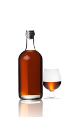 Cognac Bottle with glass isolated on white background
