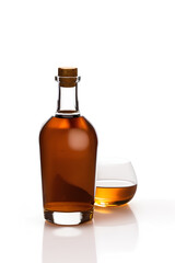 Cognac Bottle with glass isolated on white background