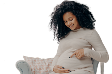 Future african american mother in white dress talking with baby inside belly