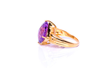 Amethyst Jewel or gems ring on white background with reflection. Collection of natural gemstones accessories. Studio shot