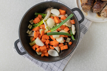Mirepoix or chooped root vegetables for cooking sauce or gravy for german beef roulades. Making and preparation. Part of a series
