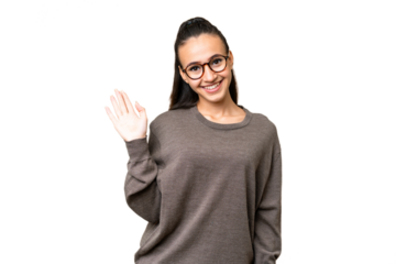 Young Arabian woman over isolated chroma key background saluting with hand with happy expression