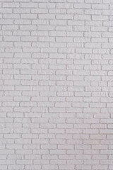 Fototapeta premium Abstract texture stained glass old plaster light gray and aged paint white brick wall background in room, blocks of masonry technology color vertical architecture wallpaper
