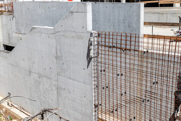 Construction site, concrete slabs and building - 575892229