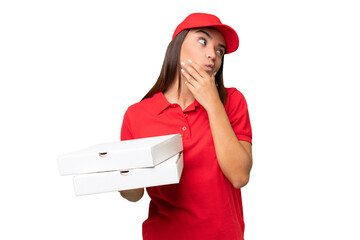 Pizza delivery caucasian woman with work uniform picking up pizza boxes isolated on green chroma...