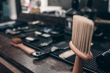 A barber's brush in a barbershop. Details