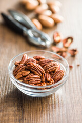 Peeled pecan nuts in bowl.