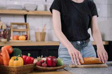 Young woman in the kitchen.