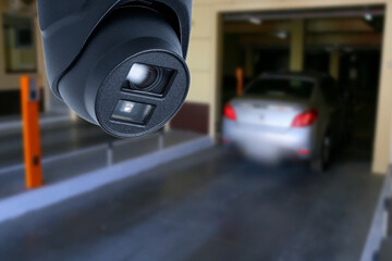cctv camera installed on the parking lot to protection security. Copy space.