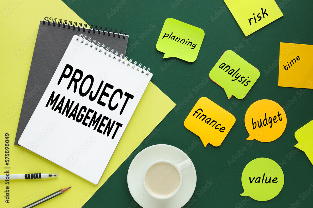 Poster project management colorful background with text on an open notepad. pen and cup of coffee