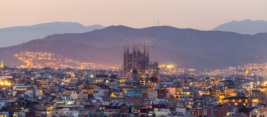 Aerial Panorama view of Barcelona city skyline and Sagrada familia at dusk time,Spain - obrazy, fototapety, plakaty