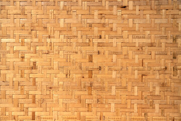 Traditional handcraft weave Thai style pattern nature background texture wicker surface for furniture material.