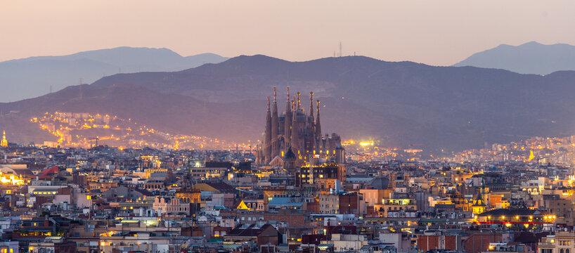 Aerial Panorama view of Barcelona city skyline and Sagrada familia at dusk time,Spain