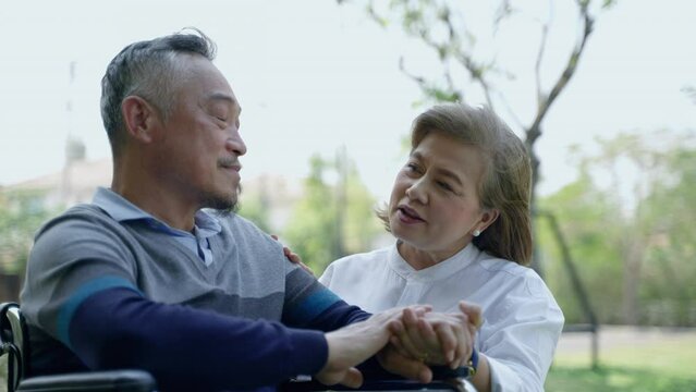  elderly Asian couple giving encouragement when the other is sick.family relationship concept, couple, care, health, illness

