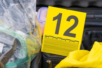 Yellow number plates for evidence police forensic tool at the crime scene