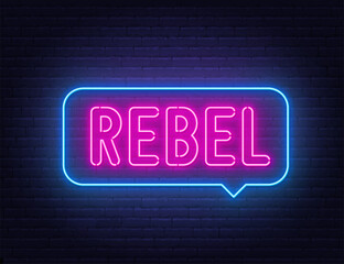 Obraz premium Rebel neon sign in the speech bubble on brick wall background.