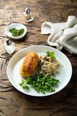 Homemade chicken rissole with mushroom and pea