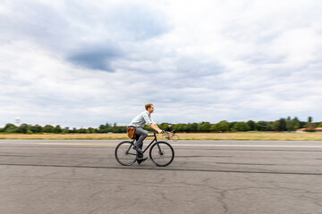 Man cycling in a city park