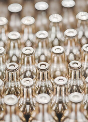 Soda charger gas cylinders set in a box. Selective DOF, close up shot background.