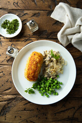 Homemade chicken rissole with mushroom and pea