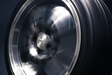 new chrome rims car wheels for a drift car custom tuning long exposure photo motion blur effect