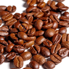 Heap of fresh roasted coffee beans isolated on white background as package design elements