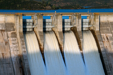 detail of gates open from hydroelectric power station