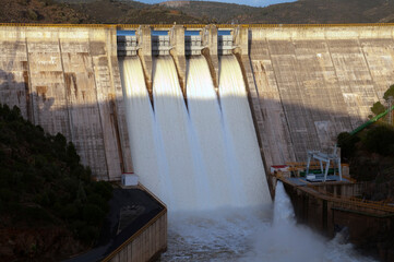 detail of gates open from hydroelectric power station