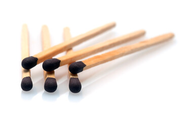 six matches used to make fire isolated on white background