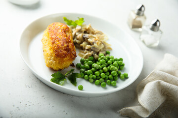 Homemade chicken rissole with mushroom and pea