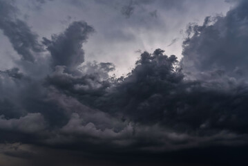 Obraz premium Dark sky with stormy clouds. Dramatic sky ,Dark clouds before a thunder-storm.