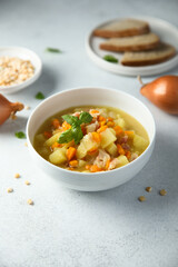 Homemade pea soup with smoked pork