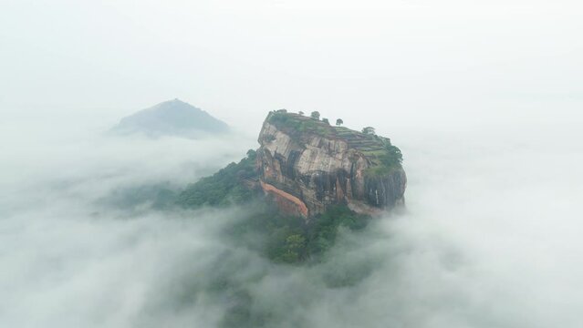 Aerial view of Sigiriya Lions Rock in Sri Lanka with foggy weather. Breathtaking magical place