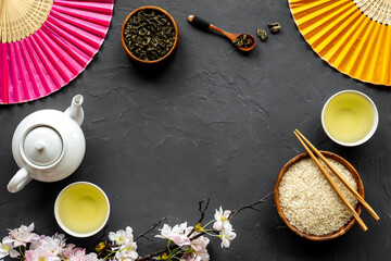 Fototapeta na wymiar Asian tabble setting with tea set and rice bowl