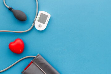 Heart attack risk. Checking blood pressure and heart rate by medical tonometer