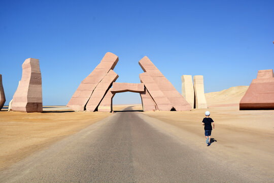 A child running in the desert